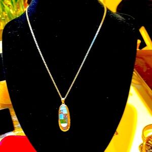 Silpada retired necklace nib has sterling silver with pattern on pendant.